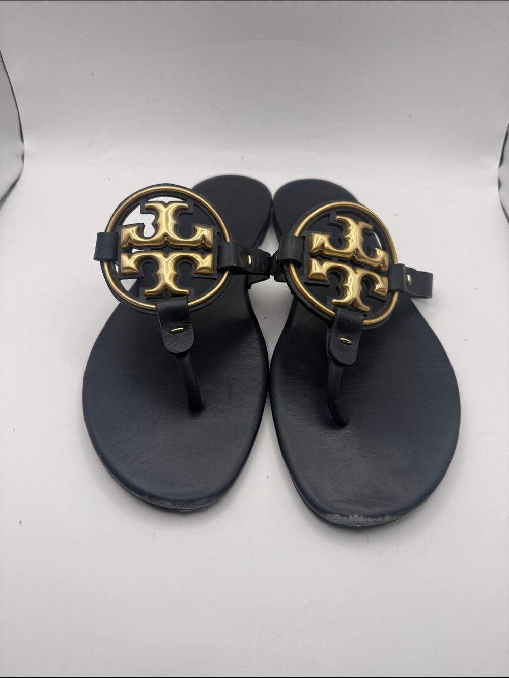 Tory Burch Black Leather Sandals with Gold Logo Medallions